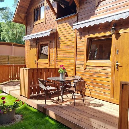 Domki Pod Debami Поберово Экстерьер фото